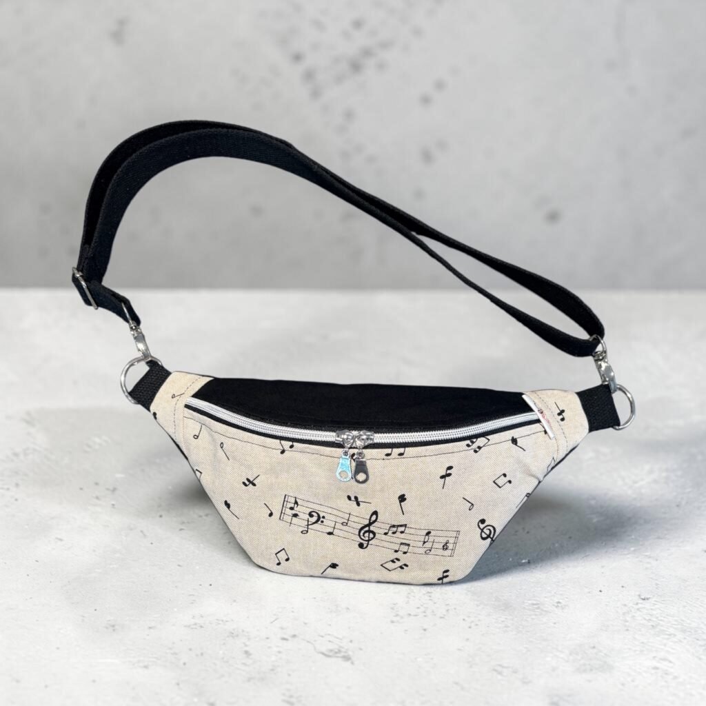 Sac banane femme Axel imprimé notes de musique noir et écru avec bandoulière réglable